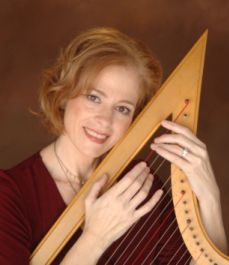 Photograph of Therese Honey with harp